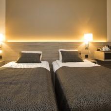 Sköna sängar i Classic-rum på Hotell Pommern.